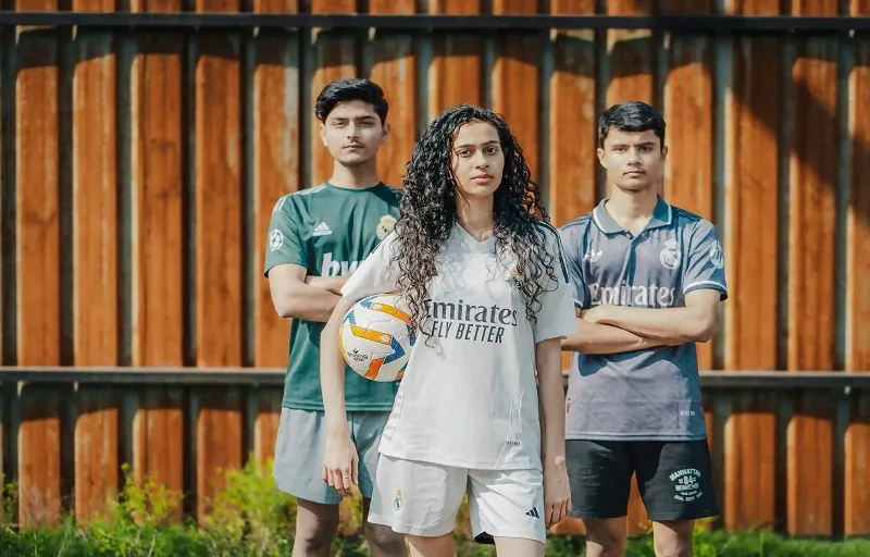 Sports and Athletics - Students in sports uniforms playing a team sport